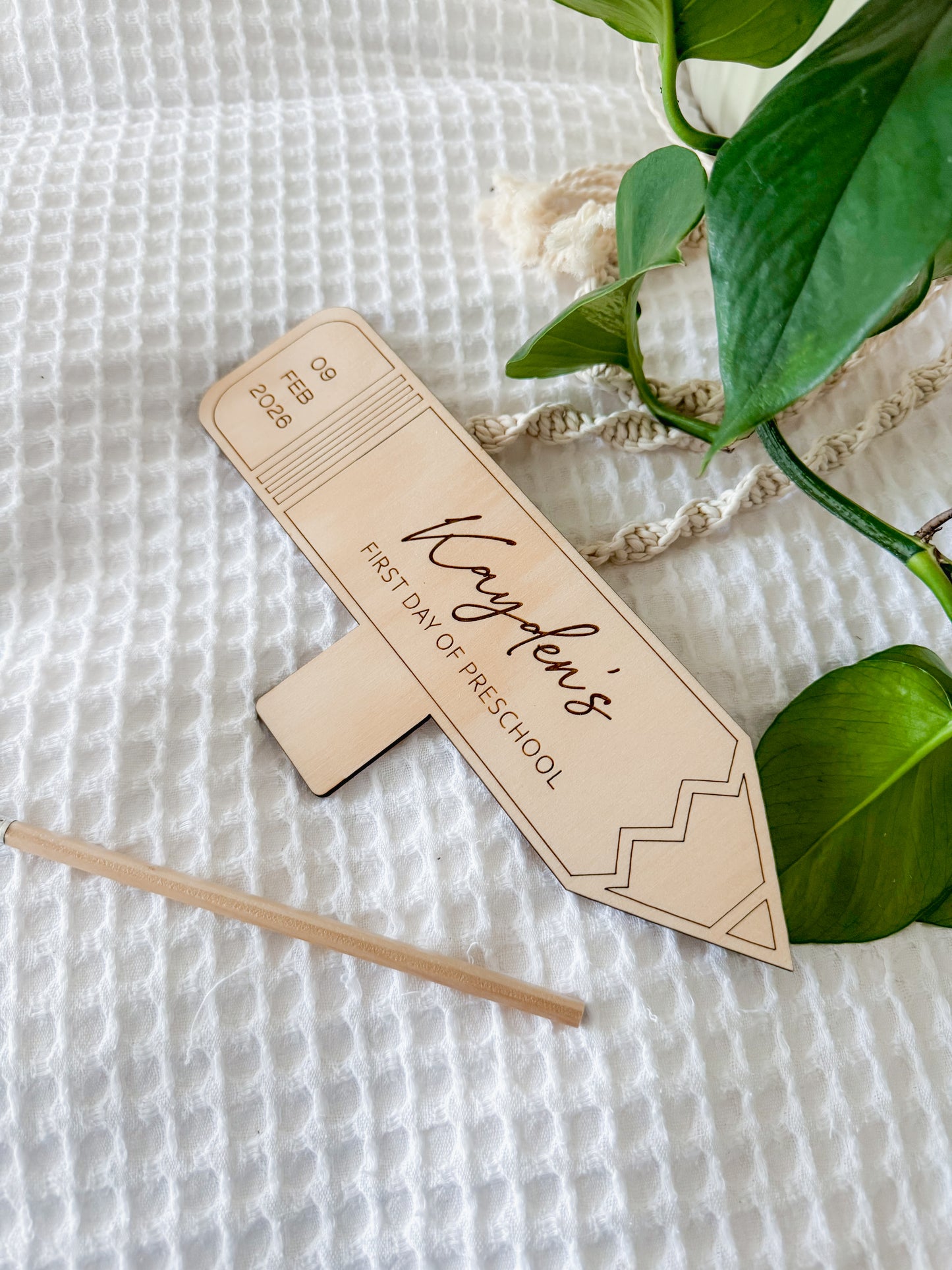 Handheld engraved first day plaque